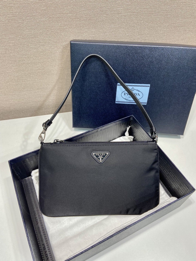 Pra*a clutch bags